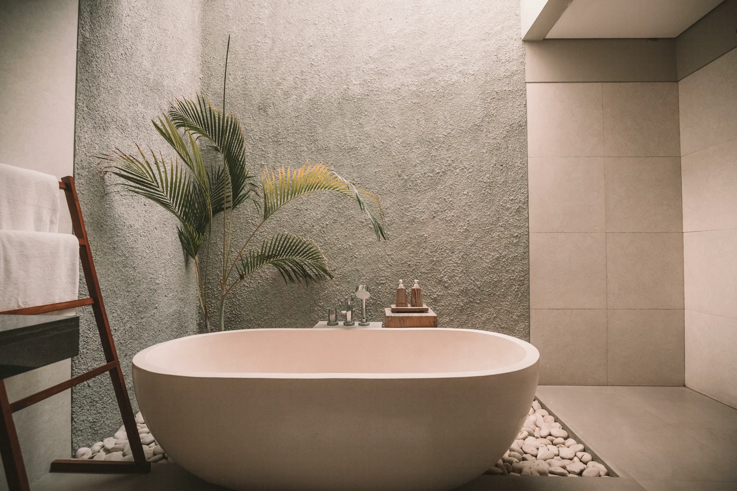 Spa-style soaking tub in a tiled bathing room